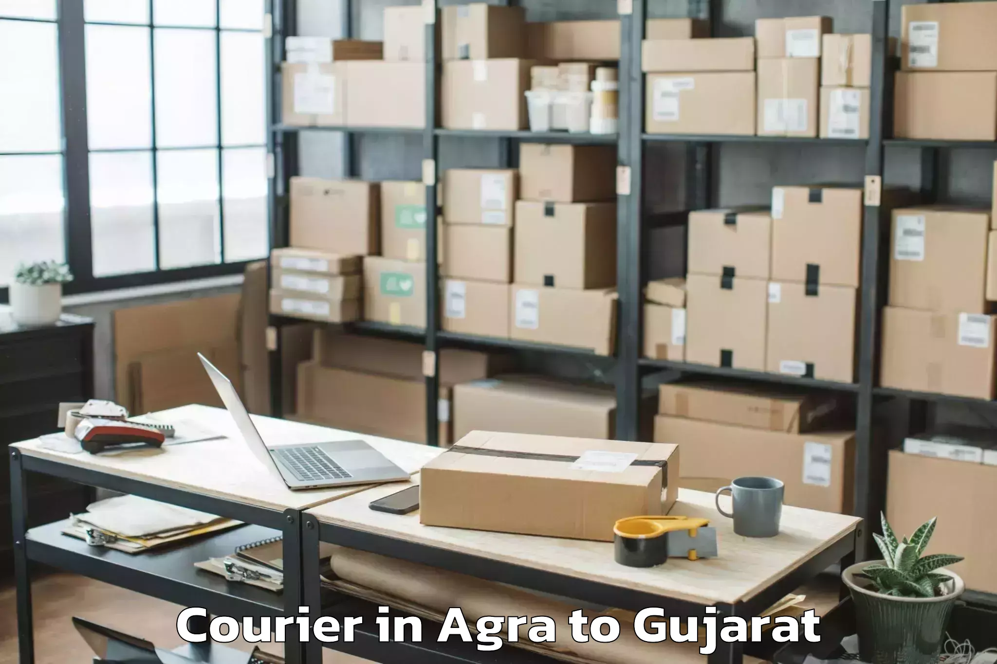 Book Agra to Rk University Rajkot Courier Online